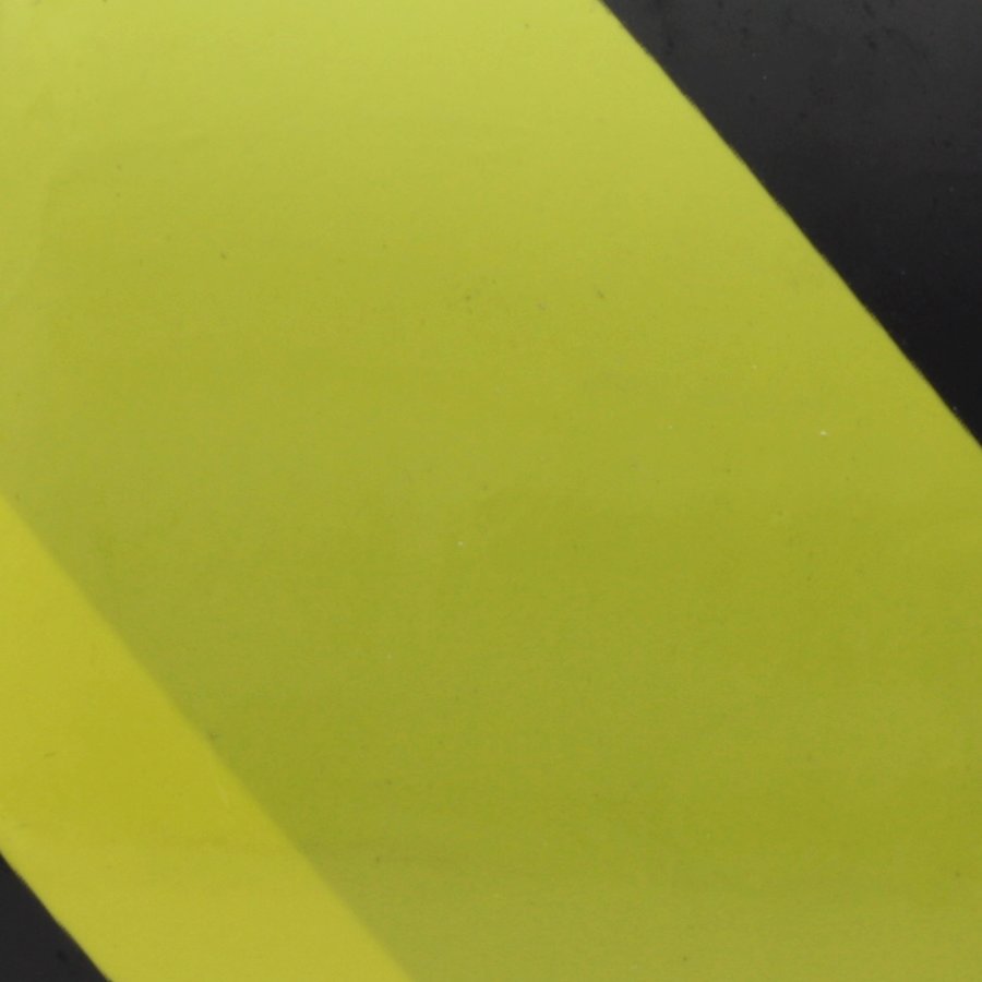Černo-žlutá pravá výstražná páska - délka 33 m a šířka 5 cm
