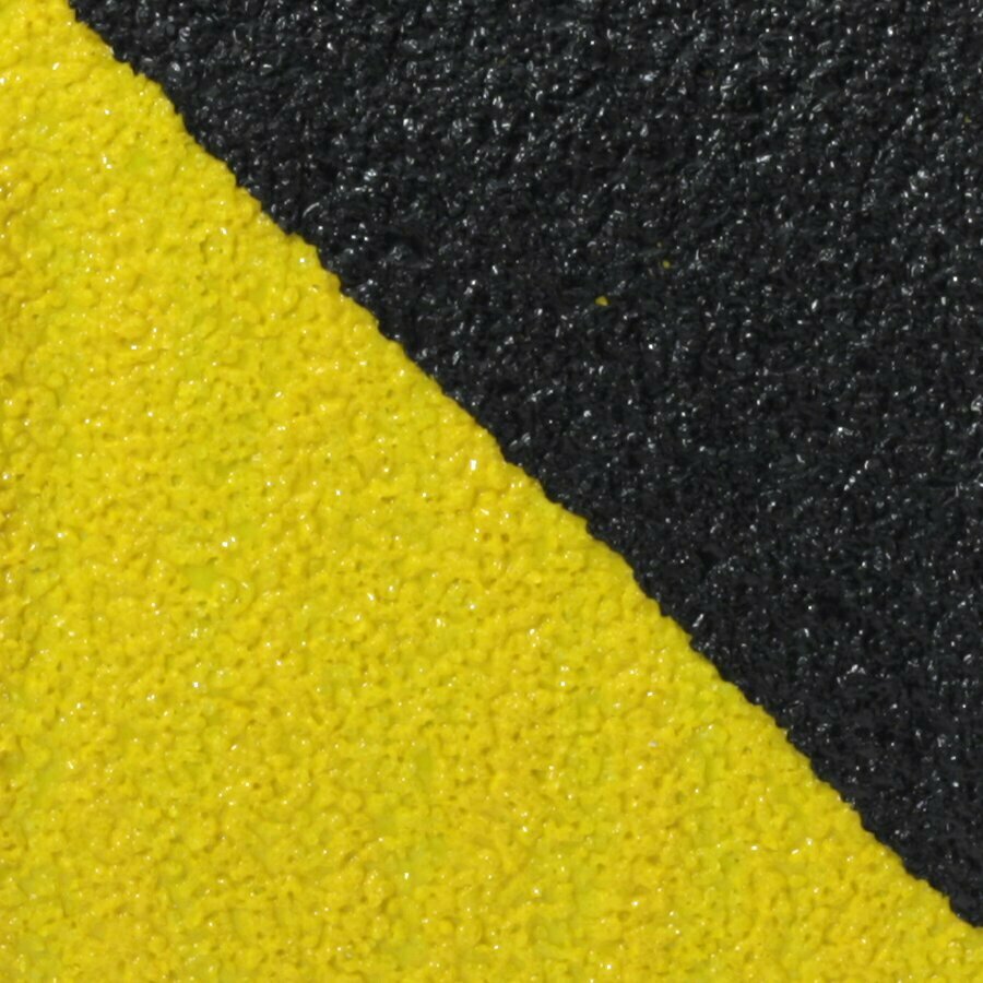 Černo-žlutá korundová protiskluzová páska pro nerovné povrchy FLOMA Hazard Conformable - délka 18,3 m, šířka 10 cm, tloušťka 1,1 mm