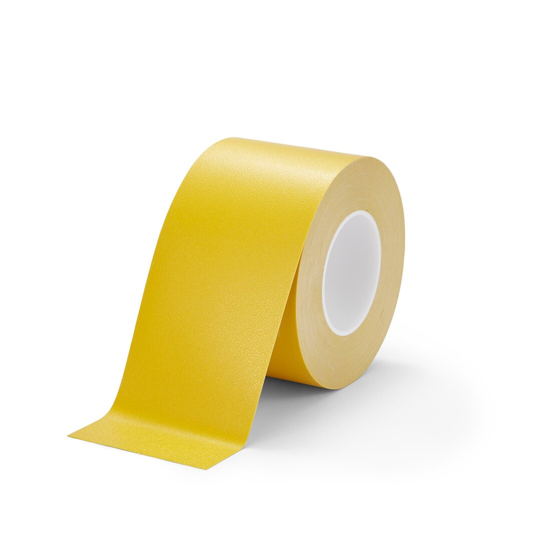 Žlutá plastová voděodolná protiskluzová páska FLOMA Standard Resilient - délka 18,3 m, šířka 10 cm, tloušťka 1 mm