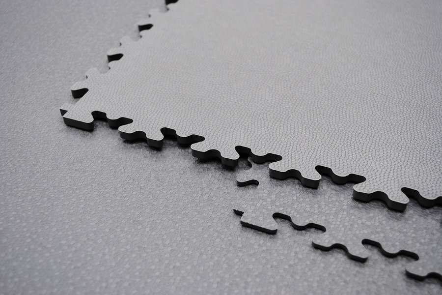 Šedá PVC vinylová zátěžová dlažba Fortelock XL Eco - délka 65,3 cm, šířka 65,3 cm a výška 0,4 cm